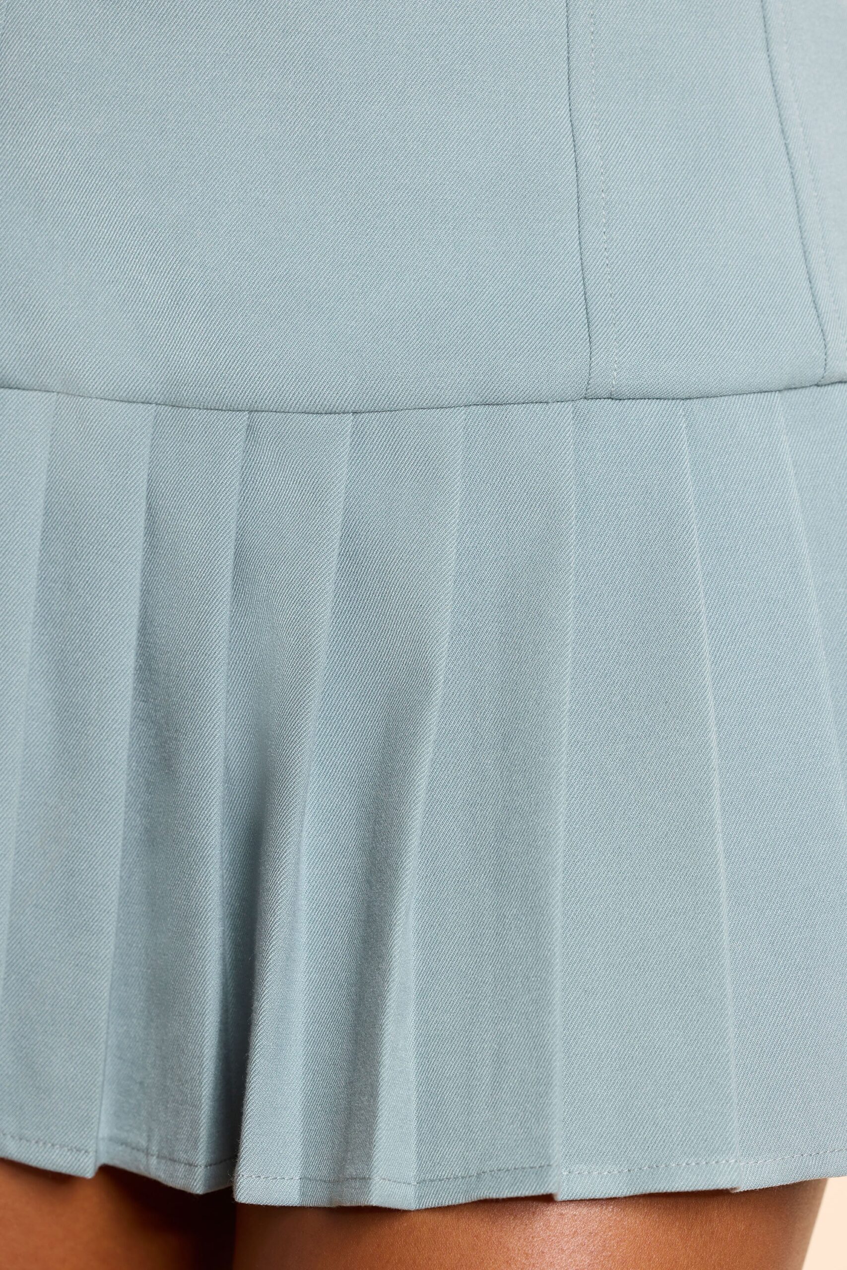 Brushed Twill Drop Waist Kilt Mini Dress in Stone Blue - Image 10