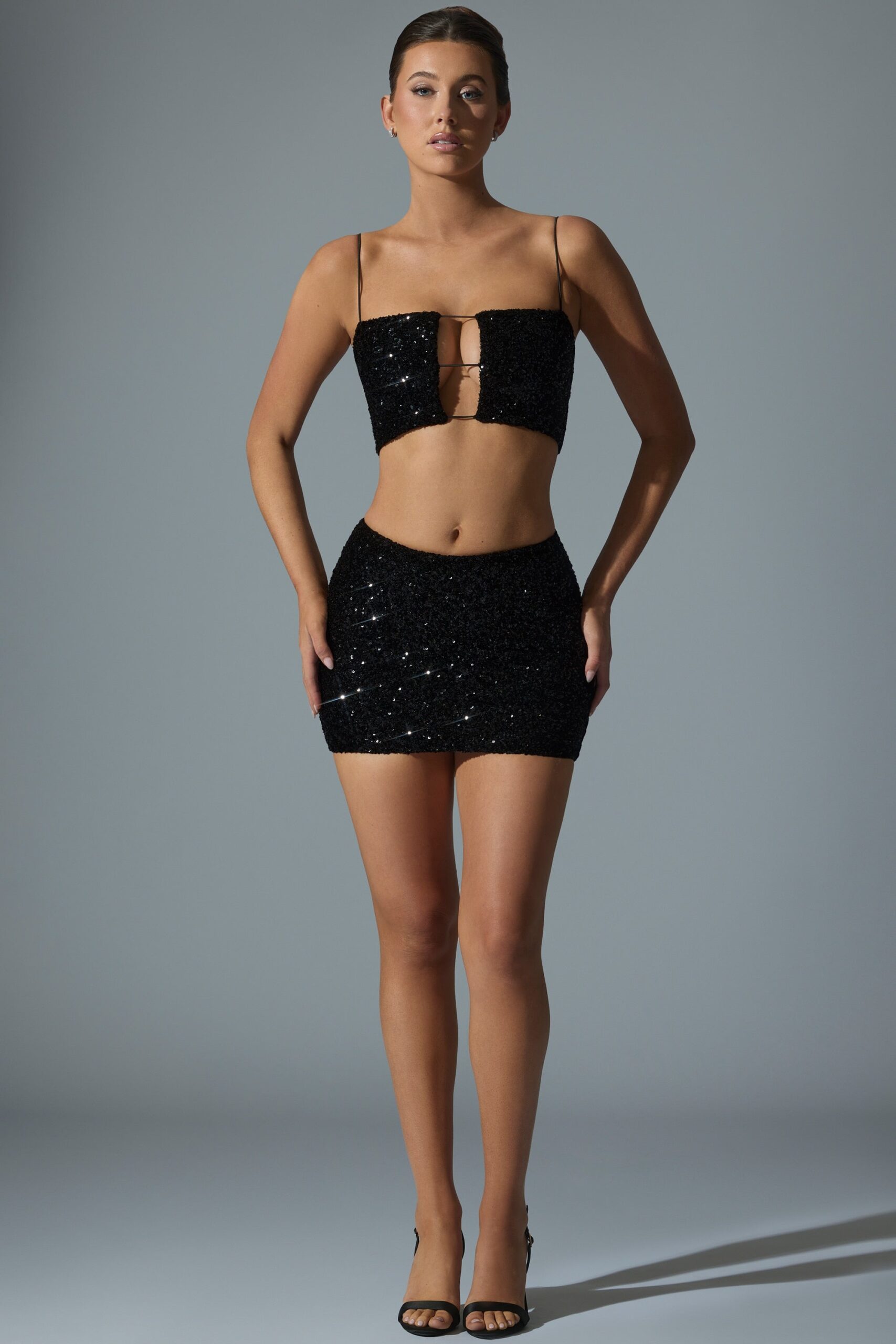 Embellished Mid-Rise Mini Skirt in Black - Image 7