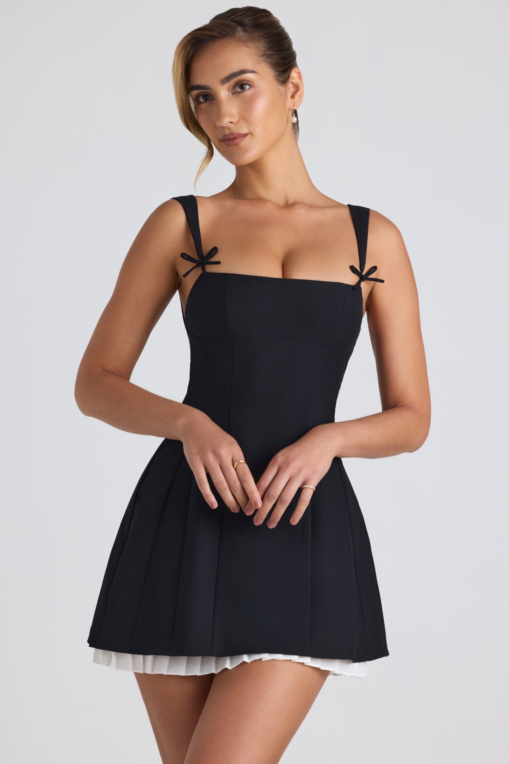 Bow-Detail Pleated A-Line Mini Dress in Black - Image 2