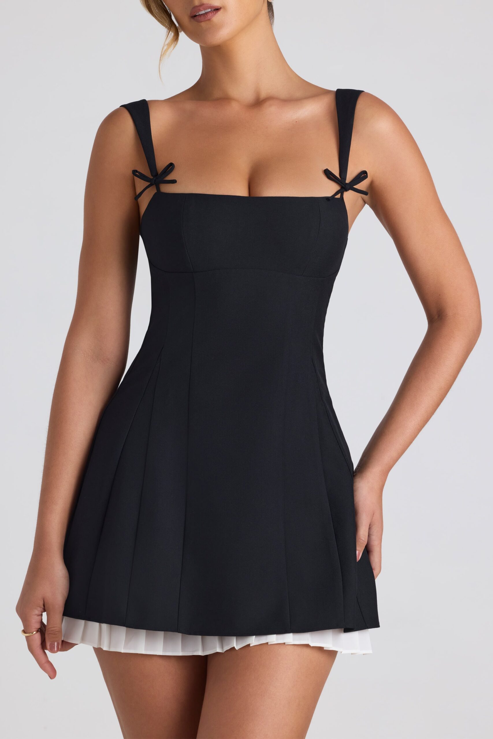 Bow-Detail Pleated A-Line Mini Dress in Black - Image 5
